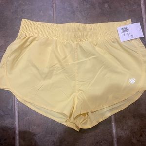 Forever 21 yellow running shorts